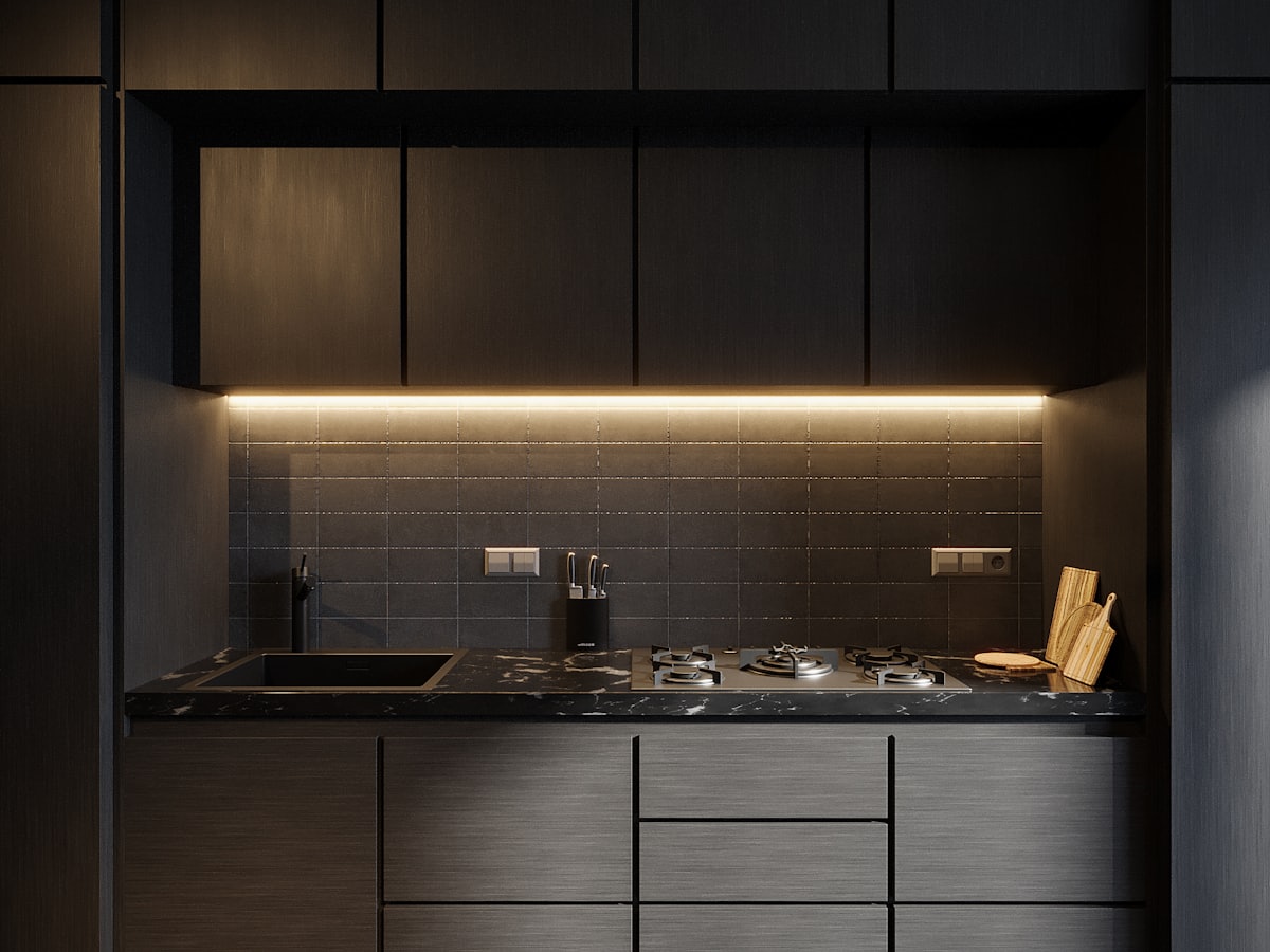 Cuisine minimaliste vue depuis le séjour